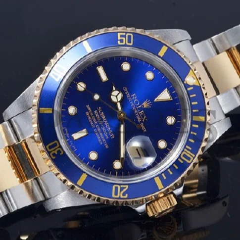 Two-tone luxury wristwatch with a blue dial